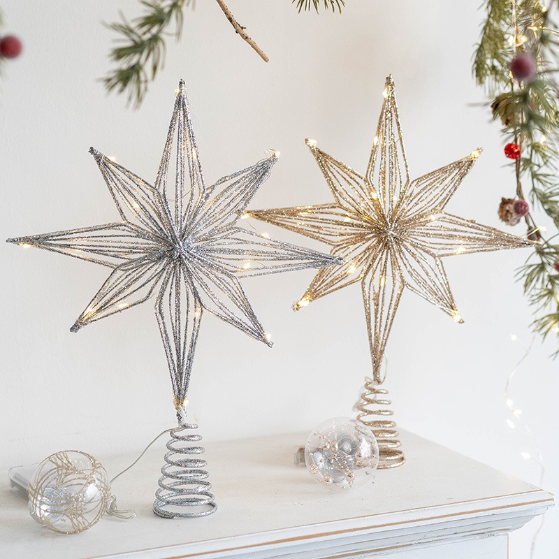زينة عيد الميلاد من الحديد على - مراجعة Star Tree Topper وسعره